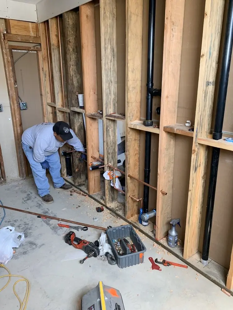 Commercial rough-in plumbing for Water Heater Replacement in Anoka